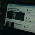 A young Romanian is browsing fake Russian influence sites about the Presidential election.