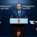 Viktor Orban stands at a podium to amnnounce the New transparency law which threatens press freedom in Hungary