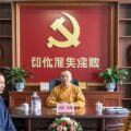 Taoist monks meet with officials of the Chinese United Front Work Department