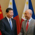 Chinese and Filipino diplomats meeting, showing the growing soft power influence operations of China in the Philippines