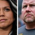 A right wing extremist watches Tulsi Gabbard as she encourages conspiracy theories about Obama