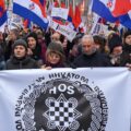 Croatian demonstrators carrying a fascist flag, showing the extremism of the homeland party