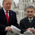 Two leaders holding newspapers outdoors. Showing Donald Trump's assault on the media being taken from the Orban playbook