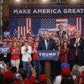 Trump supporters at campaign rally showing l Farage who failed to declare his trip as per Parliamentary rules