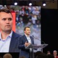 Charlie Kirk at a large event before his assassination