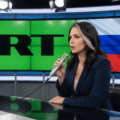 Tulsi Gabbard appearing on RT where she has spouses positions consistent with Russian propaganda
